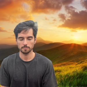 Man meditating by mountain